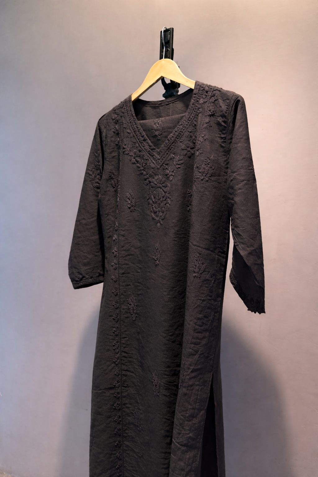 Elegant Chanderi Silk suit set adorned with delicate Chikankari embroidery — lightweight, graceful, and crafted for timeless festive sophistication.