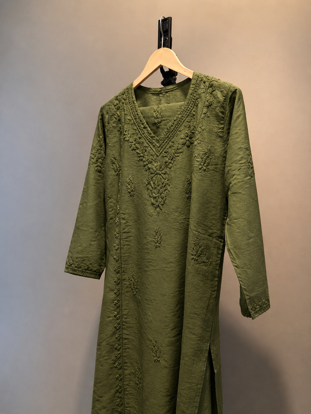 Elegant Chanderi Silk suit set adorned with delicate Chikankari embroidery — lightweight, graceful, and crafted for timeless festive sophistication.